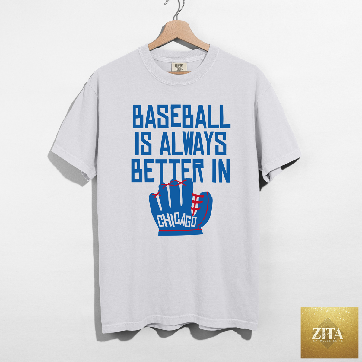 White Zita La Belle Elite baseball tee featuring Chicago-themed "Baseball Is Always Better In Chicago" graphic.