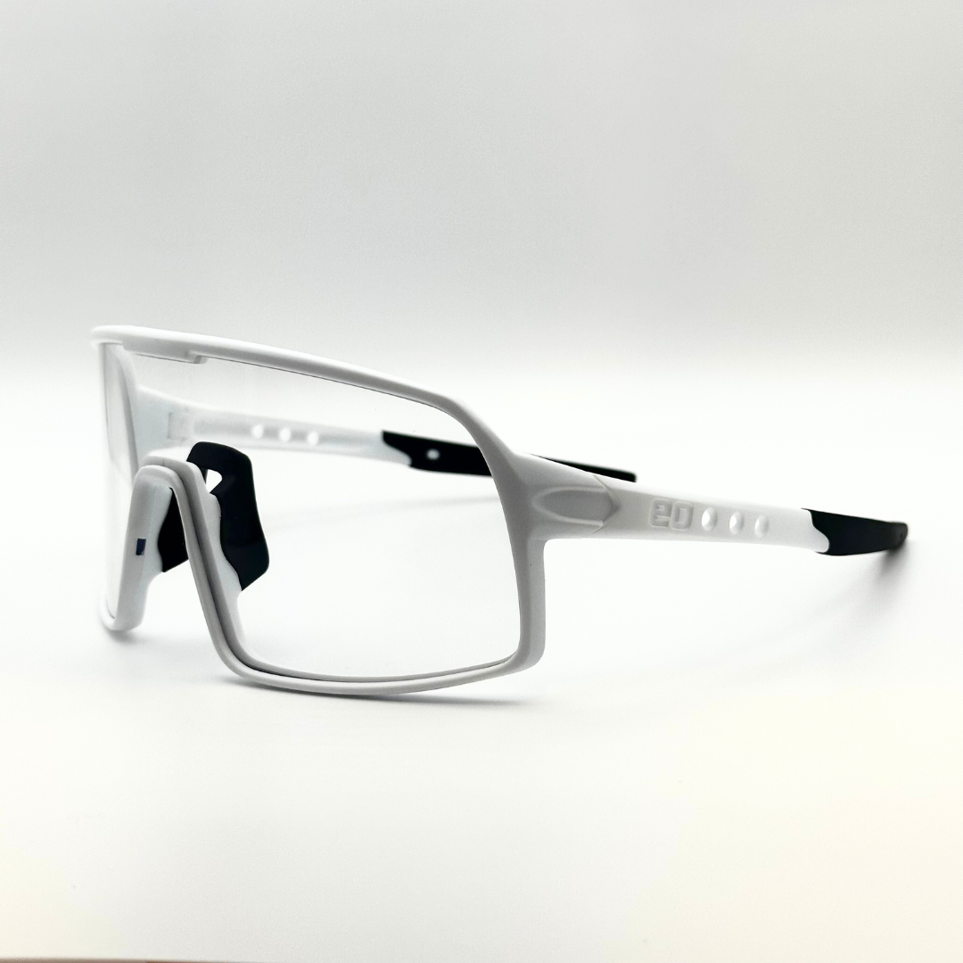 Eastern Outer Mojave sunglasses with photochromic lenses, white frame, angled view showing stylish design and lens details.