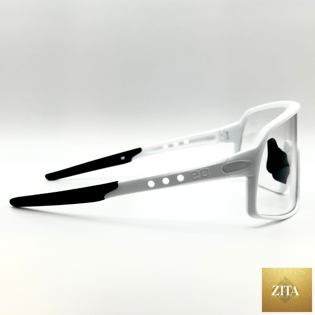 Eastern Outer Mojave sunglasses with photochromic lenses, white frame, profile view showing sleek design and adjustable arms.