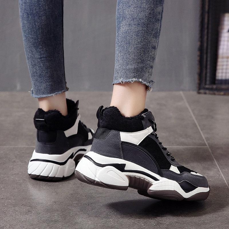 Winter women's Stevvex sneakers with breathable fabric, warm fur lining, anti-slip sole, and high heels for casual winter wear.