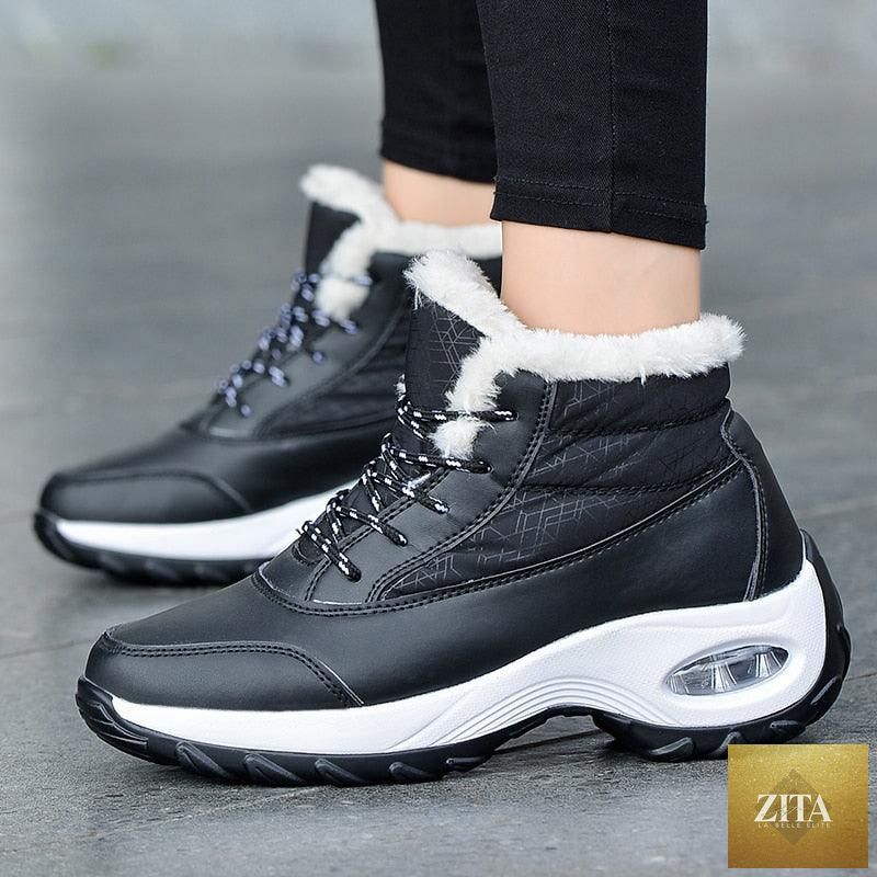 Stevvex women's winter sneakers with breathable fabric, warm fur lining, anti-slip sole, casual high heels, and soft sole design.