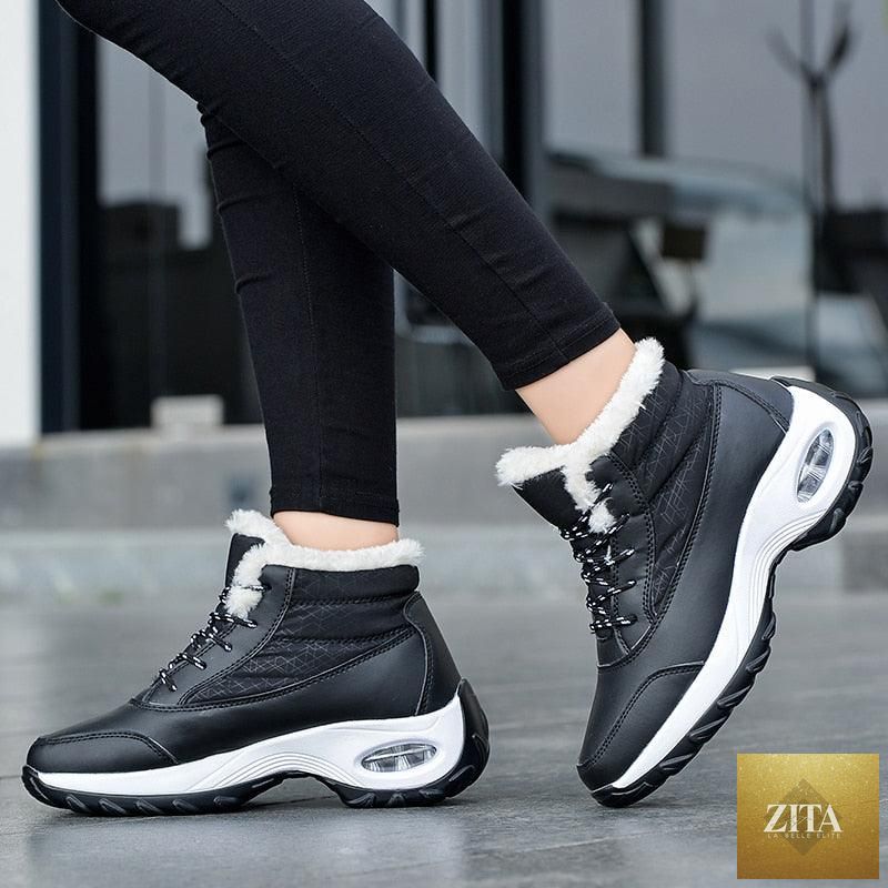 Breathable winter women's sneakers by Stevvex with warm fur lining, anti-slip soft soles, casual high heels, and stylish design.