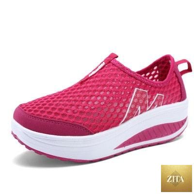Women Stevvex casual sneakers with breathable air mesh, platform design, ideal for walking, fitness, and everyday style.