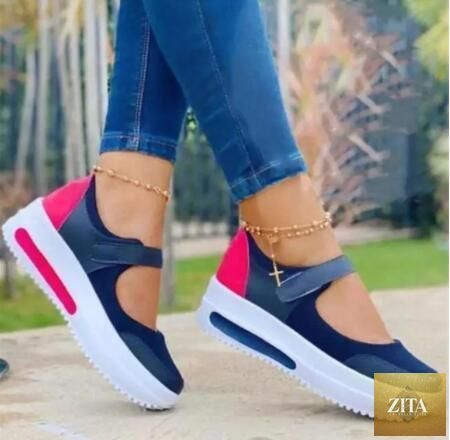 Women Stevvex elegant sneakers with thick soles, breathable mesh material, lace-up design, ideal for casual and athletic wear.