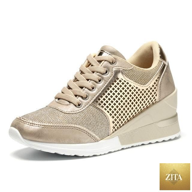 Women’s lightweight Stevvex gold and silver walking and jogging sneakers with height-increasing heels and comfortable casual style.