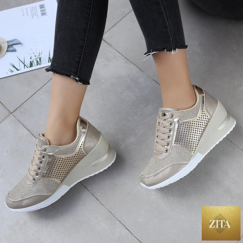 Women’s gold and silver Stevvex walking and jogging sneakers with height-increasing insoles, lightweight, casual, and comfortable for daily wear.
