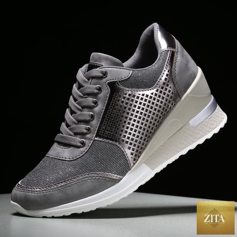 Women’s gold and silver lightweight walking and jogging sneakers by Stevvex, featuring height-increasing and comfortable sport design.