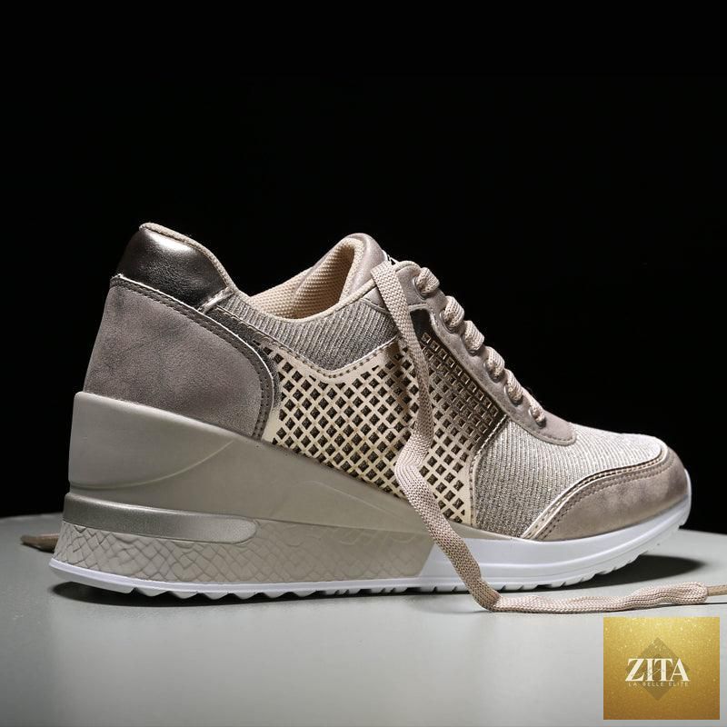 Women’s gold and silver Stevvex walking jogging sneakers, lightweight sport shoes with casual style and comfortable high heel design.