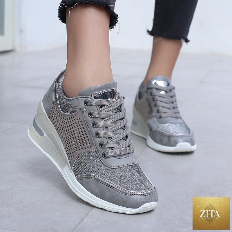 Women’s Stevvex gold and silver walking jogging sneakers with height-increasing, lightweight, casual design for everyday comfort.