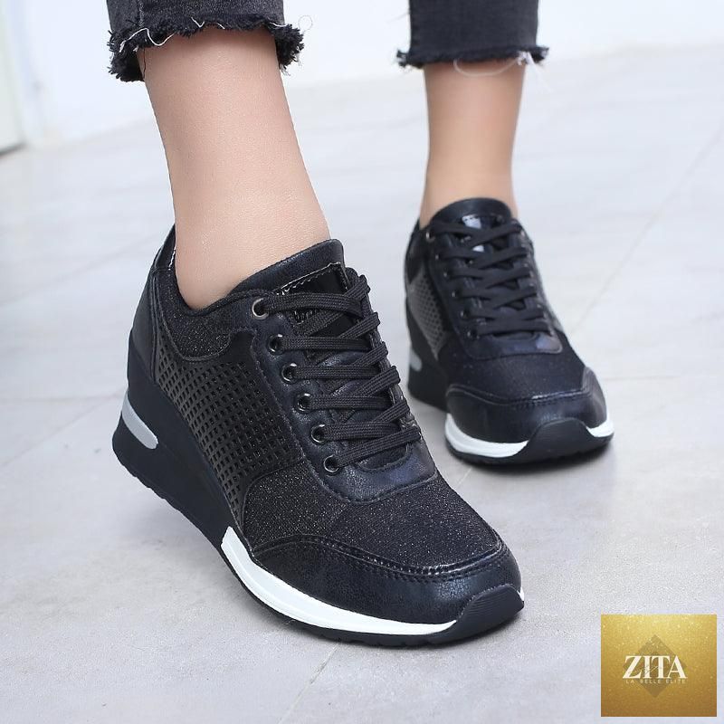 Women’s gold and silver Stevvex walking and jogging sneakers, lightweight, casual, with height-increasing design and comfortable fit.