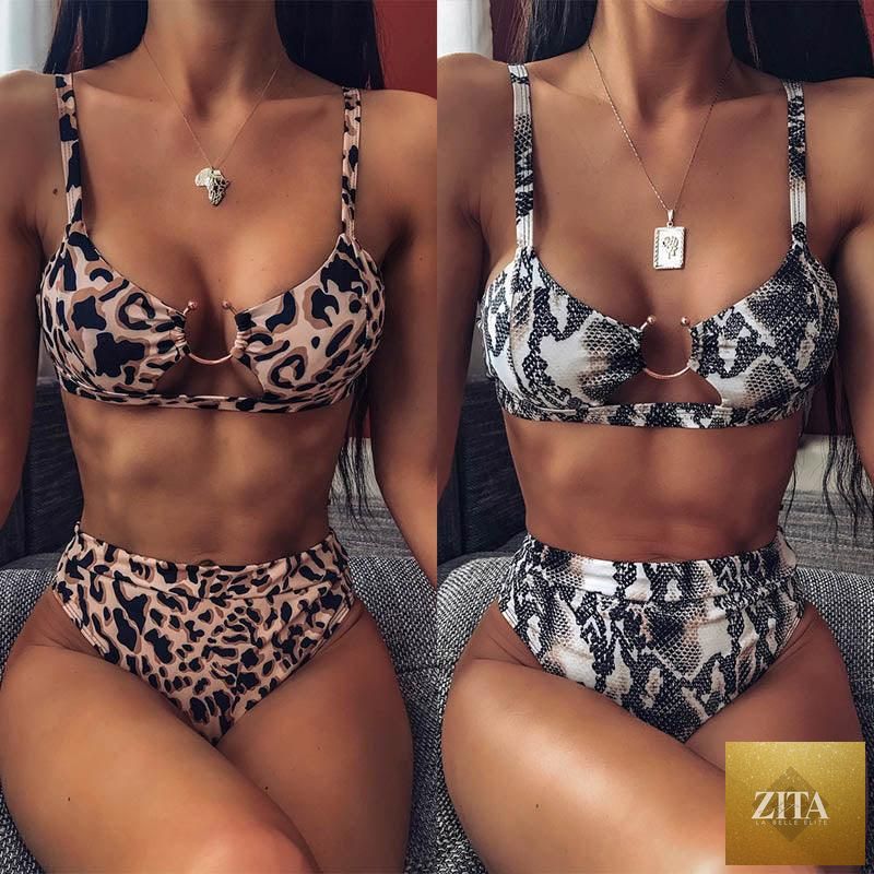 Women’s high waist bikini swimsuit with metal ring accents, cutout design, tie-back, and thong style, by Stevvex.