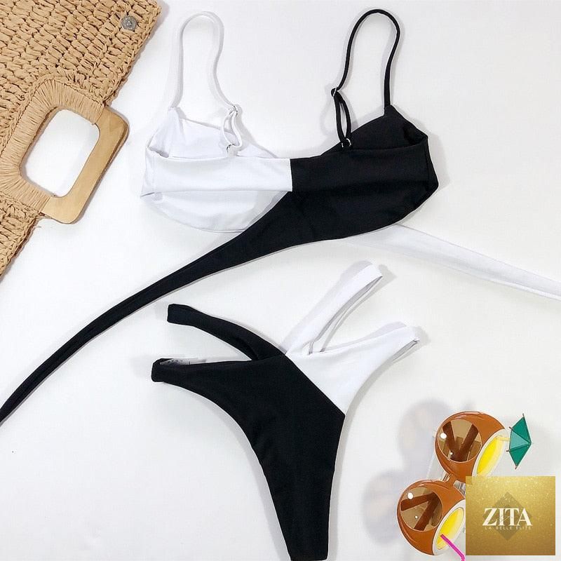 Women’s high waist bikini swimsuit with metal ring details, cross bands, cutout design, and tie-back style from Stevvex.
