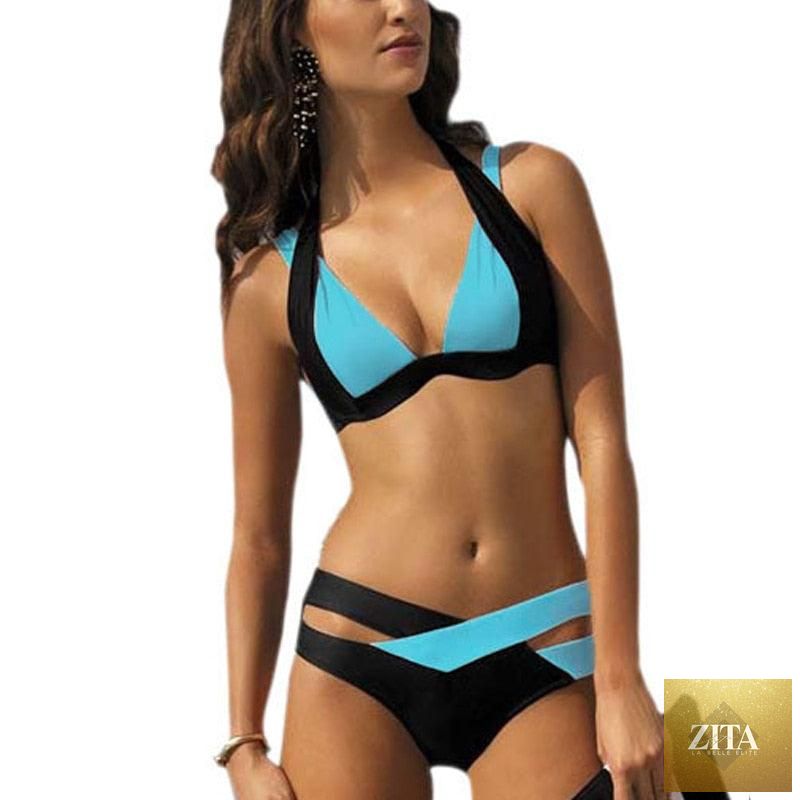 Women wearing Stevvex high waist bikini swimsuit with scoop neck, 2-piece swimwear, comfortable and elegant for swimming.