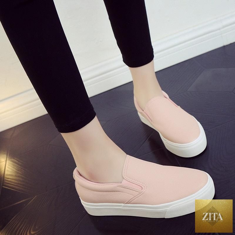 Women wearing Stevvex leather espadrille sneakers, casual slip-on platform shoes with vulcanized soles, perfect for spring and summer.