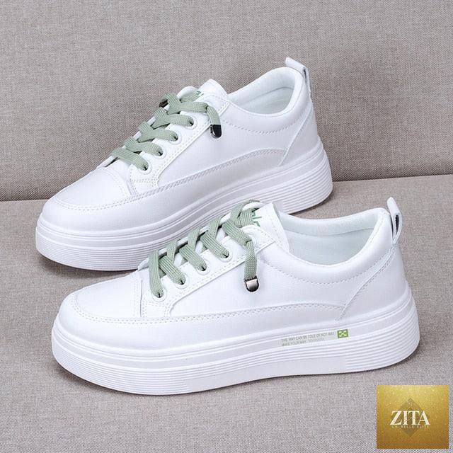Women Stevvex leather sneakers with breathable white vulcanized design, casual lace-up shoes for walking and everyday wear.