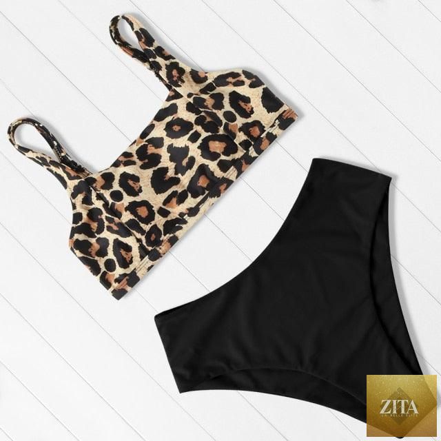 Women wearing Stevvex leopard print bikini with one-shoulder top and high-waist bottom, perfect for summer beachwear.