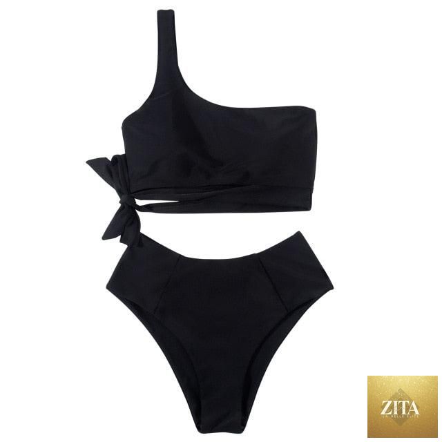 Women’s leopard print bikini with one-shoulder top and high-waist bottoms, featuring push-up style for summer beachwear.