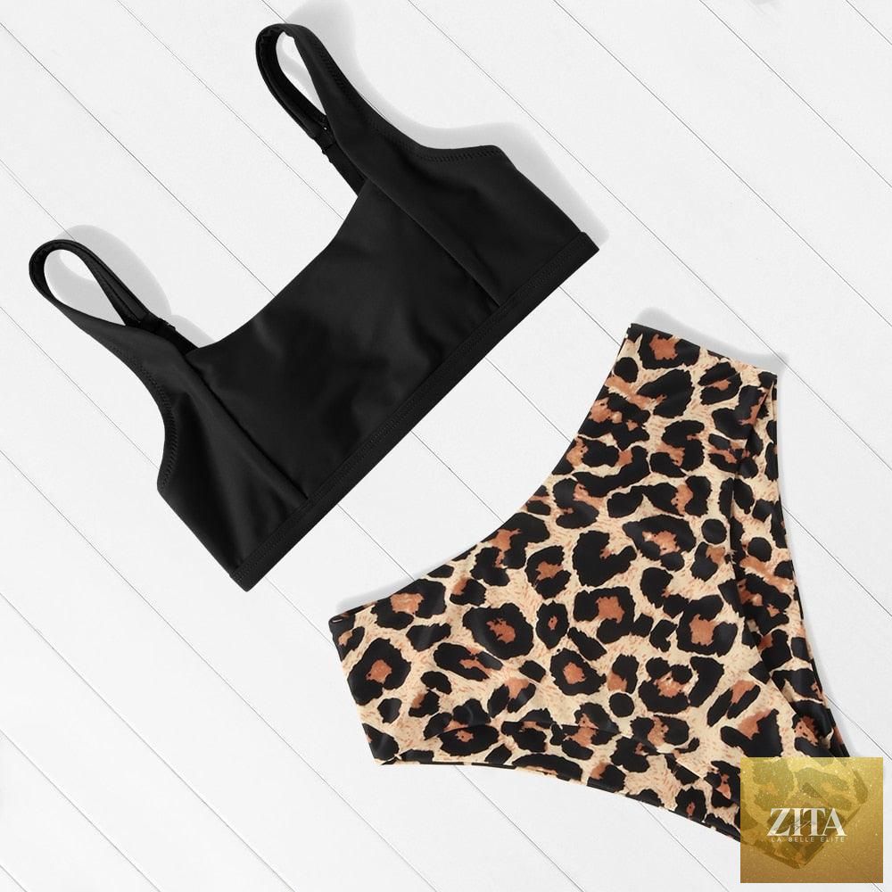 Women’s leopard print bikini by Stevvex featuring a one-shoulder top and high-waist bottoms, ideal for summer beachwear.