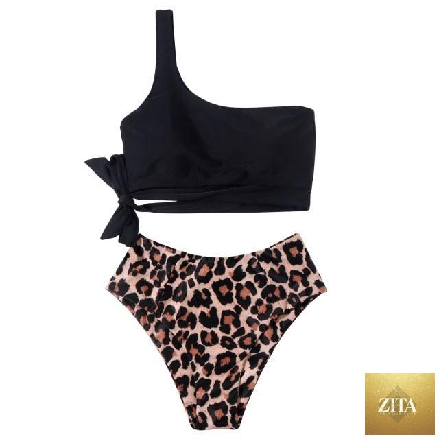 Women wearing Stevvex leopard print bikini with one-shoulder top and high-waist bottoms, perfect for summer beachwear.