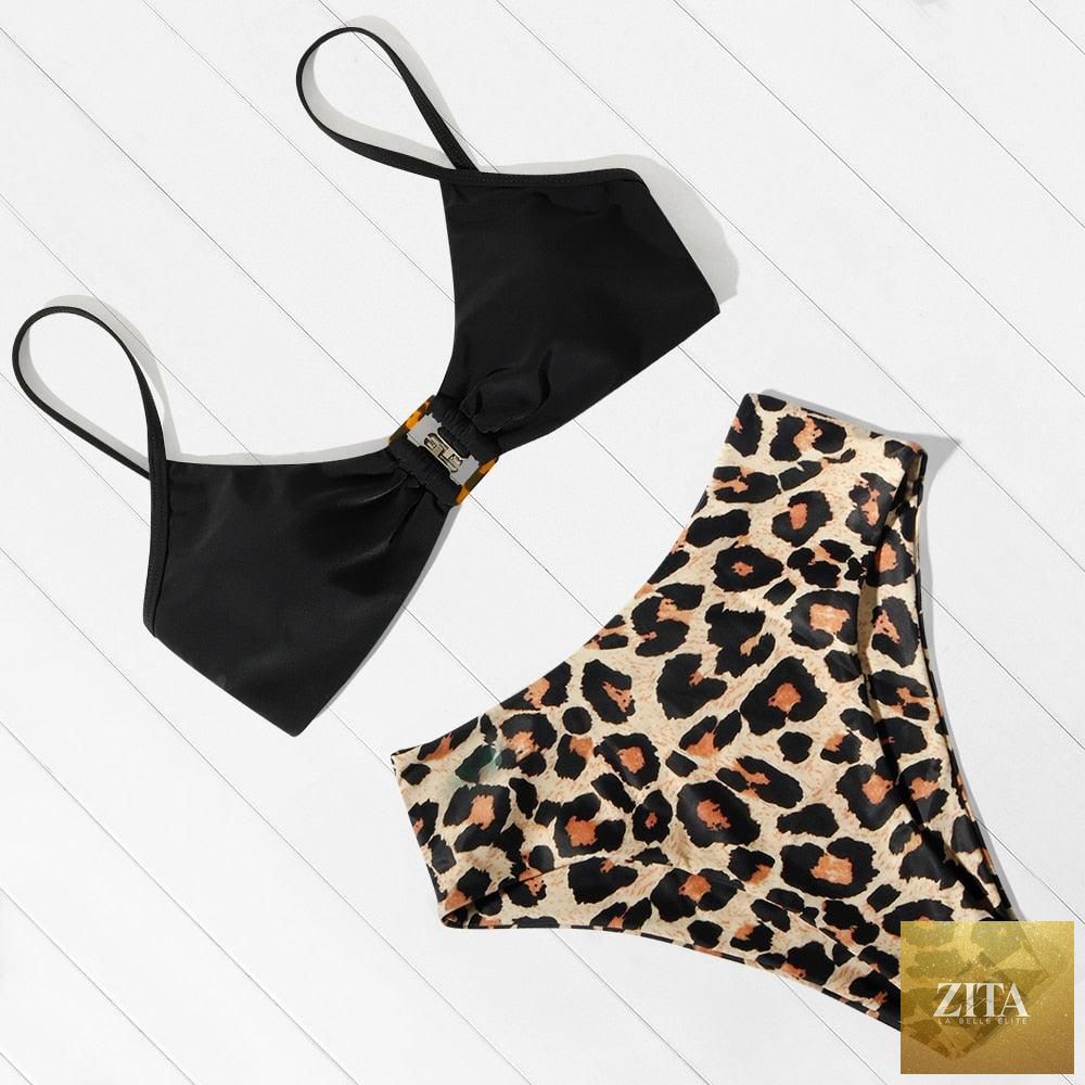 Women’s leopard print bikini by Stevvex, featuring one-shoulder top and high-waist bottoms, perfect for summer beachwear.