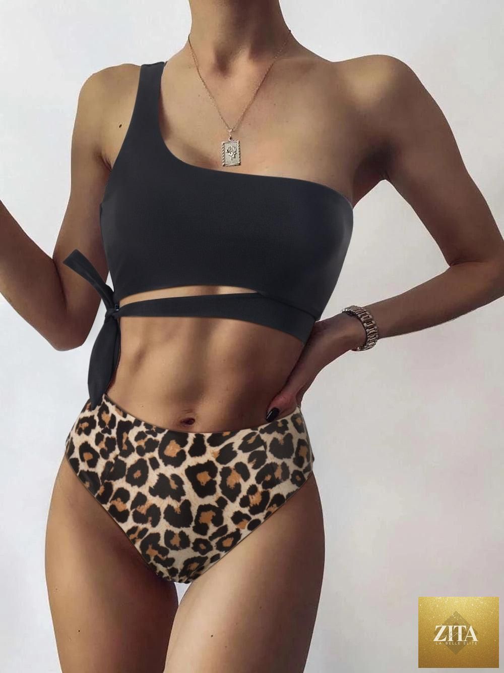 Women’s leopard print bikini by Stevvex, one-shoulder top with high-waist bottom, perfect for summer beachwear and swimming.