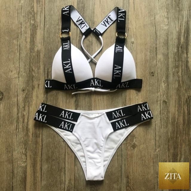 Women’s luxury black and white swimwear with push-up bikini top, lace-up design, halter straps, letter print, and bandage style.