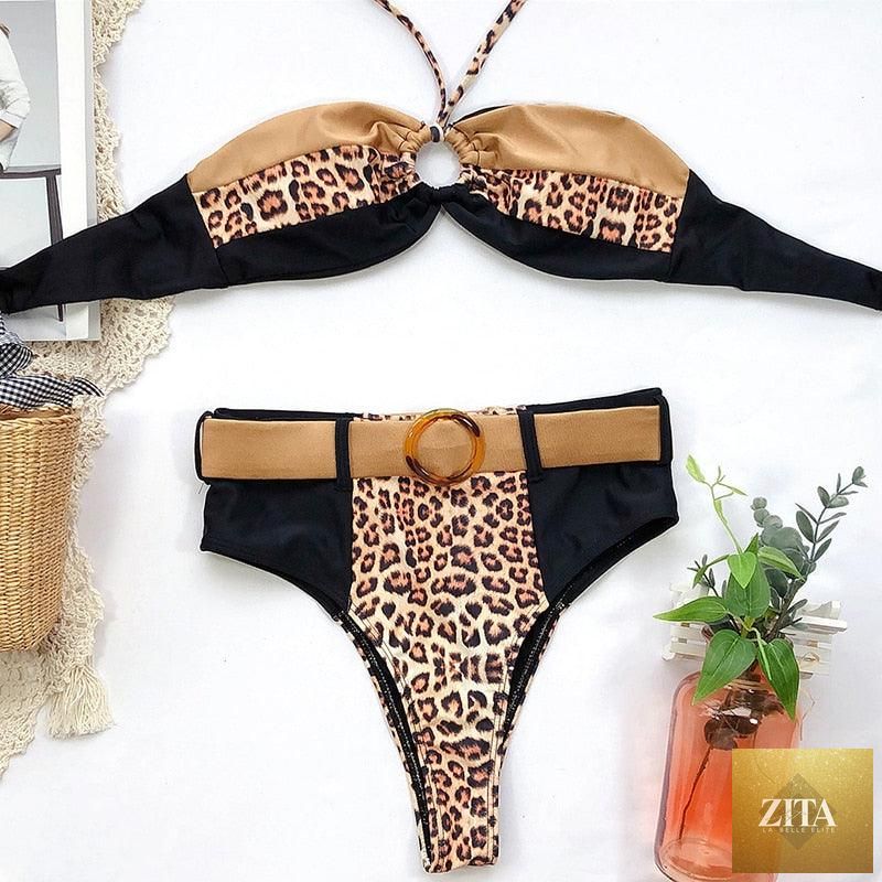 Women wearing Stevvex luxury leopard high waist bikini with push-up bra, tie side cutouts, high cut and padded for stylish swimwear.