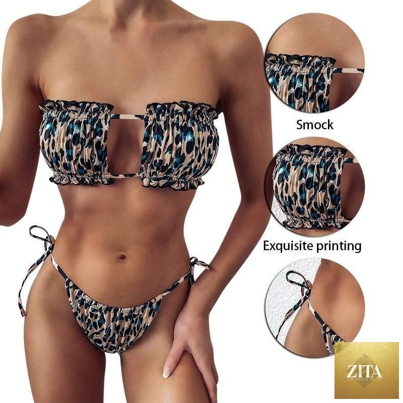 Women wearing a luxury leopard print high waist bikini with push-up bra, tie sides, cutout design, and high-cut padded swimwear.