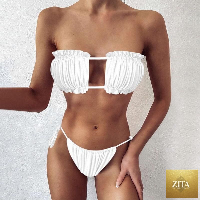 Women wearing Stevvex luxury leopard high waist bikini with push-up bra, tie sides, cutout details, and high-cut padded swimwear.