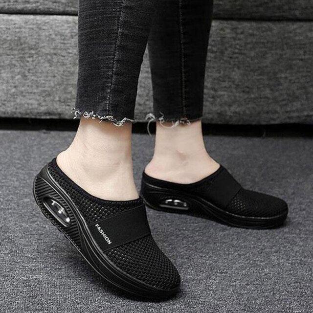 Women Stevvex mesh lightweight clogs with breathable design, air cushion soles, slip-on style, and arch support for casual outdoor walking.