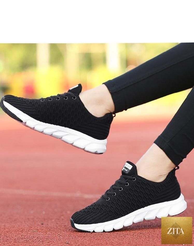 Women Stevvex running sneakers with breathable mesh, lightweight flat shoes, lace-up design, suitable for outdoor casual and sports use.