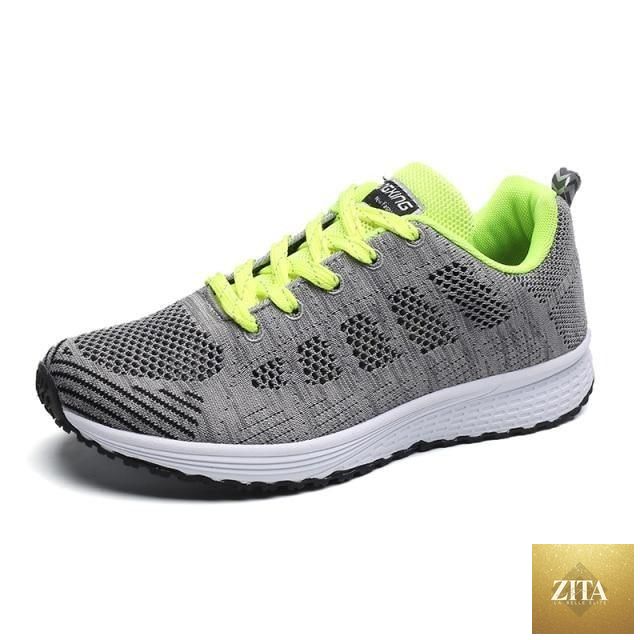 Women Stevvex breathable running sneakers with lightweight mesh, flat design, lace-up closure, ideal for casual outdoor sports.