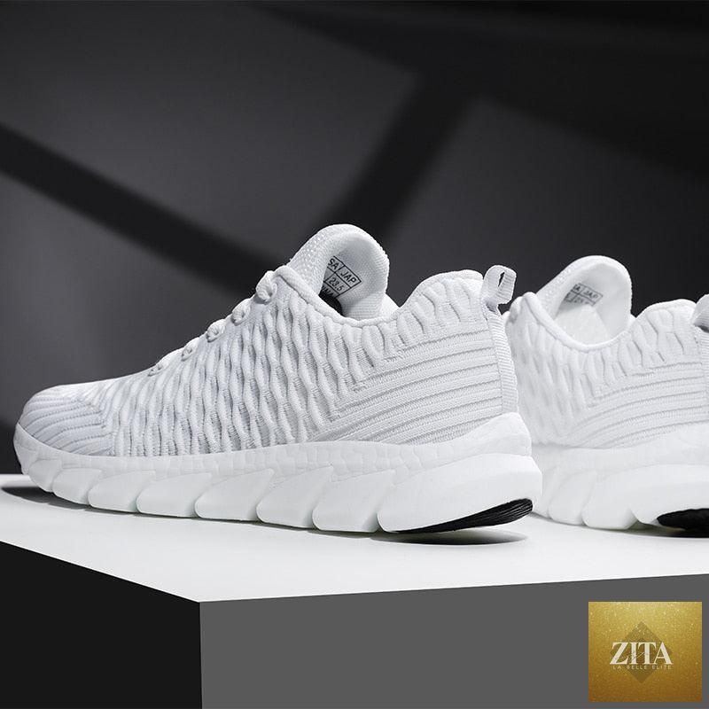 Women Stevvex running sneakers with breathable mesh, lightweight flat shoes, casual lace-up design, ideal for outdoor sports.