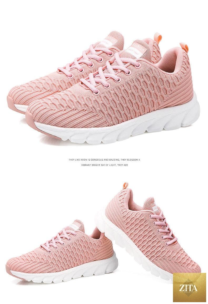 Women Stevvex running sneakers with breathable mesh, lightweight flat shoes, lace-up design, ideal for outdoor casual and sports use.