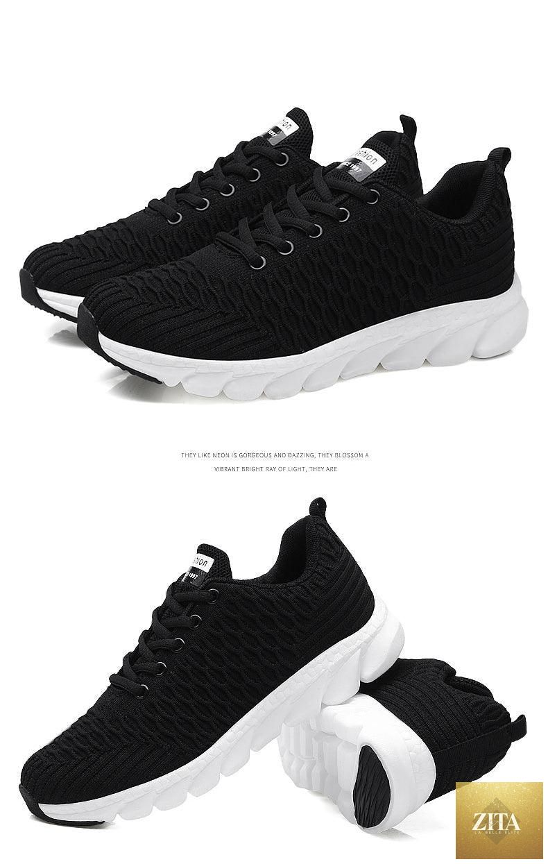 Women Stevvex running sneakers with breathable mesh, lightweight flat shoes, lace-up design, ideal for outdoor casual and sports use.