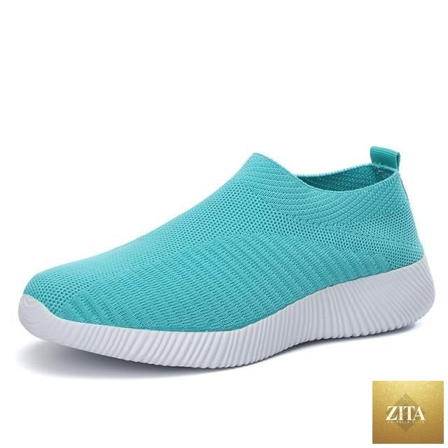 Women Stevvex running sneakers with breathable mesh, lightweight flat shoes, lace-up design, ideal for outdoor casual and sports use.