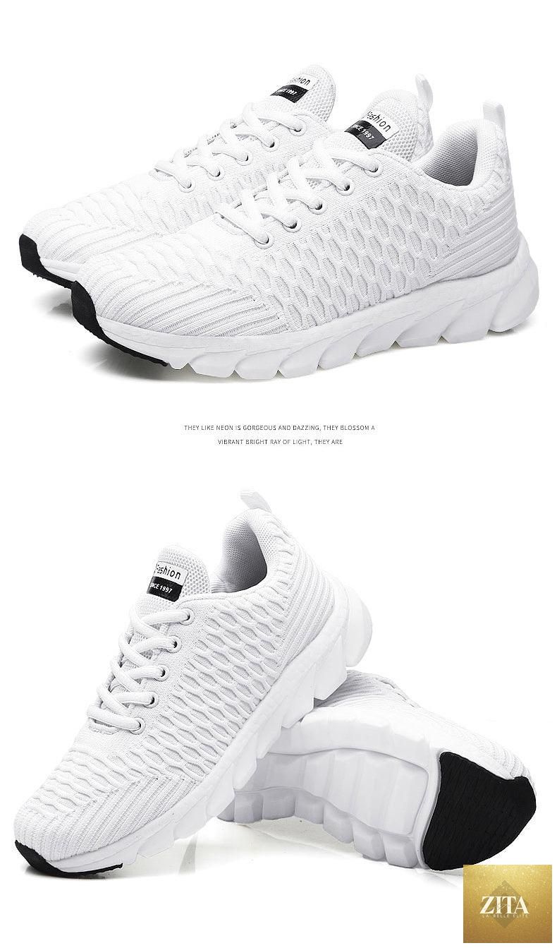 Women Stevvex running sneakers with breathable mesh, lightweight flat shoes, lace-up design, ideal for casual outdoor activities.