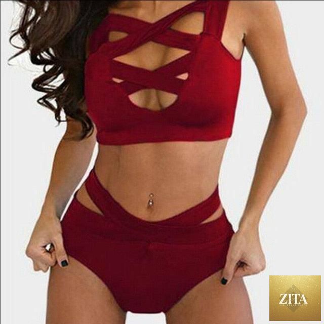 Black women's bikini set with high waist, push-up padding, criss-cross design, and tie-back, perfect for luxurious swimwear.
