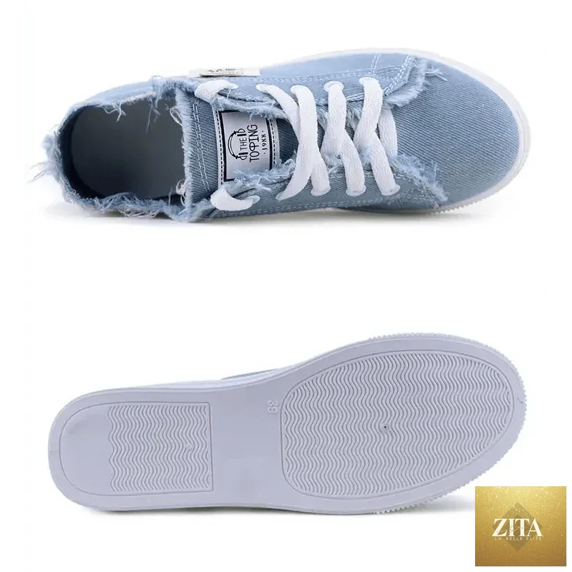 Stylish women's blue canvas sneakers by Stevvex, featuring breathable denim material and a classic summer design.