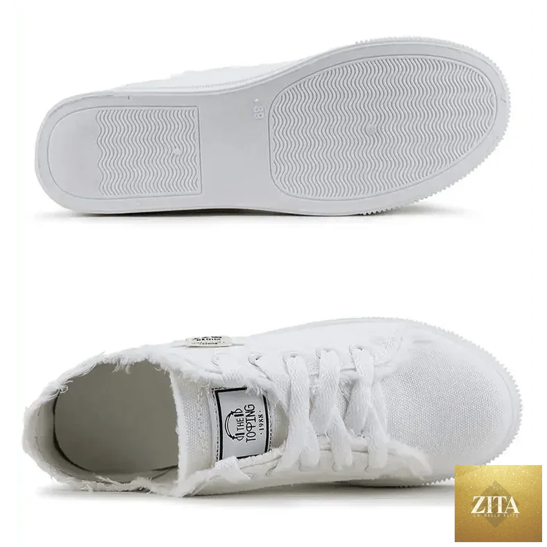 Women's blue canvas sneakers by Stevvex featuring breathable denim fabric, perfect for stylish summer casual wear.