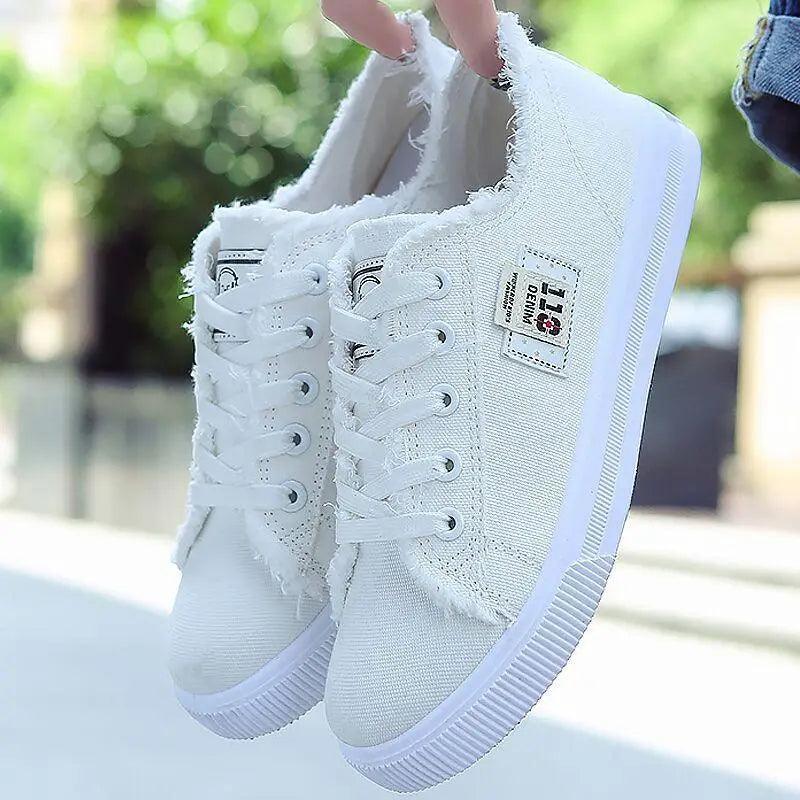 Blue canvas women's sneakers by Stevvex, breathable and stylish for summer, featuring classic denim design and fashionable comfort.