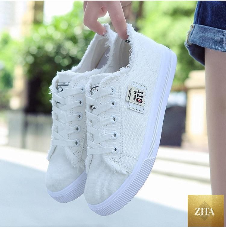 Women's breathable canvas summer sneakers with lace-up design, low-top white casual shoes perfect for outdoor and athletic wear by Stevvex.