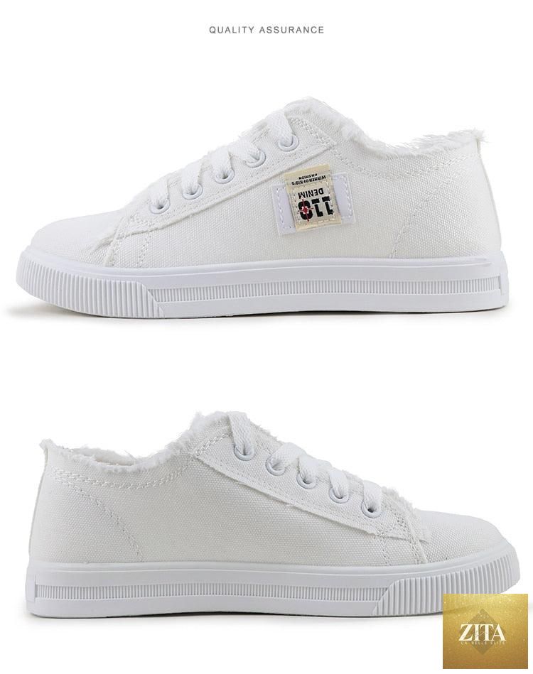 Women's breathable canvas summer sneakers by Stevvex featuring white low-top lace-up tennis shoes for casual outdoor wear.