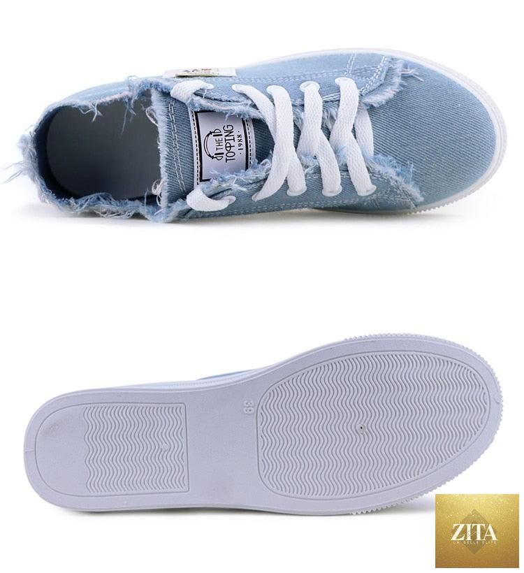 Women’s breathable canvas summer sneakers by Stevvex, low-top lace-up tennis shoes with white casual design, perfect for outdoor wear.