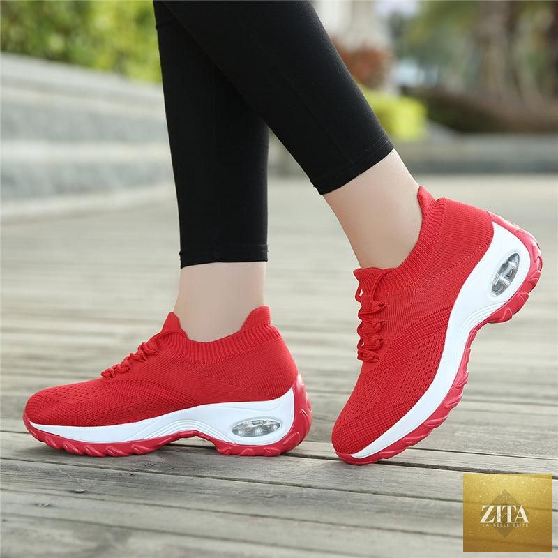 Women’s casual chunky sneakers by Stevvex featuring platform design, knit mesh upper, air cushion sole, slip-on style, and comfortable fit.