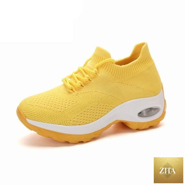 Women’s casual chunky sneakers by Stevvex with platform sole, mesh upper, air cushion, slip-on design, and knitted casual style.