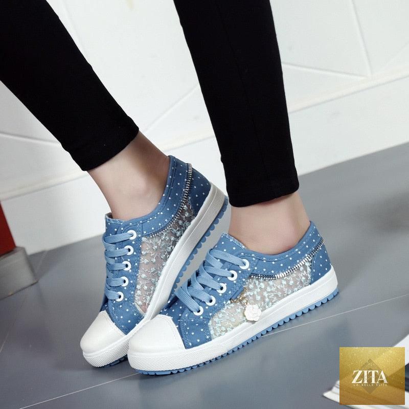 Women’s breathable mesh casual sneakers by Stevvex, low-top canvas shoes with lace-up design for comfortable summer walking.