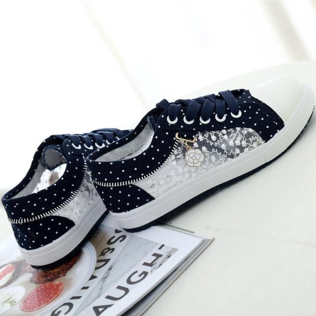 Women’s breathable mesh casual sneakers by Stevvex, low-top canvas shoes with lace-up design, ideal for summer walking comfort.