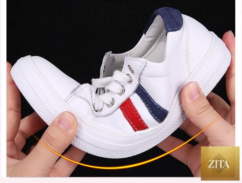 Women’s white leather casual sneakers by Stevvex, flat vulcanized tennis shoes for everyday comfort and stylish sportswear.