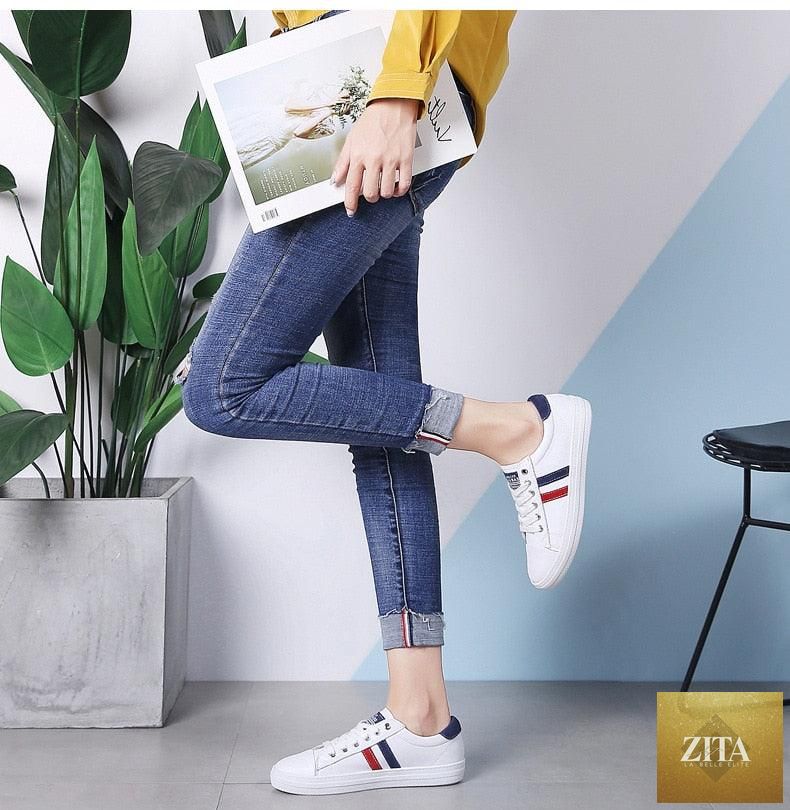 Women's genuine leather sneakers by Stevvex, white casual and sports shoes with flat sole and vulcanized rubber for comfort.